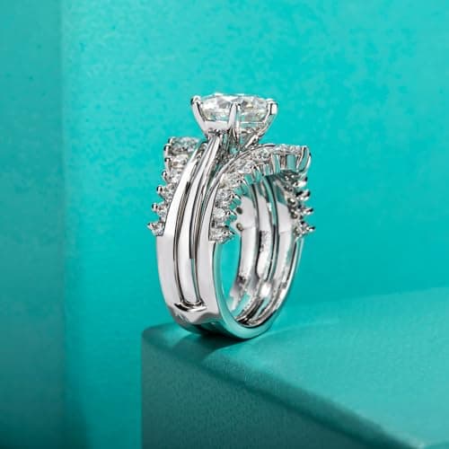 Sure, here's a refined and simplified version of the original title:

AnuClub Moissanite Bridal Set 4.52cttw (3CT Center Stone) D Color VVS1 Sterling Silver Ring with Certificate