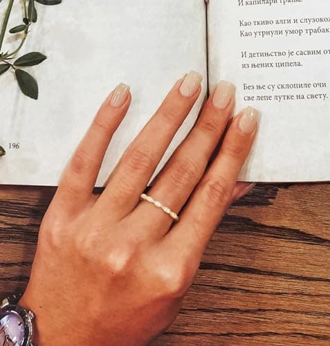 Refined and simplified title: TIGRADE Oval CZ Eternity Ring with Milgrain Detailing, Ideal for Women's Anniversaries and Wedding Bands Sizes 3-13